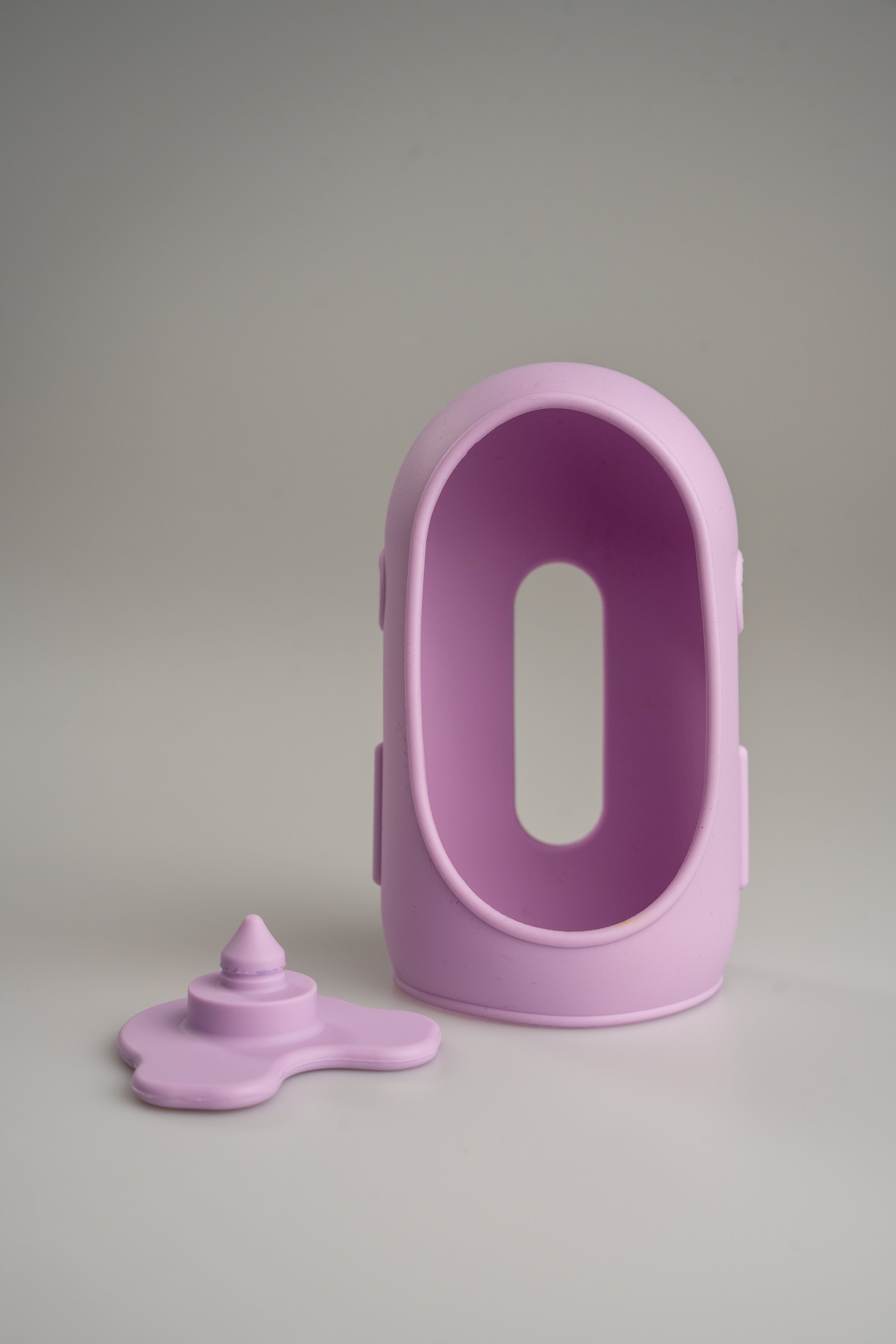 Purple silicone outfit for Jules with its matching base