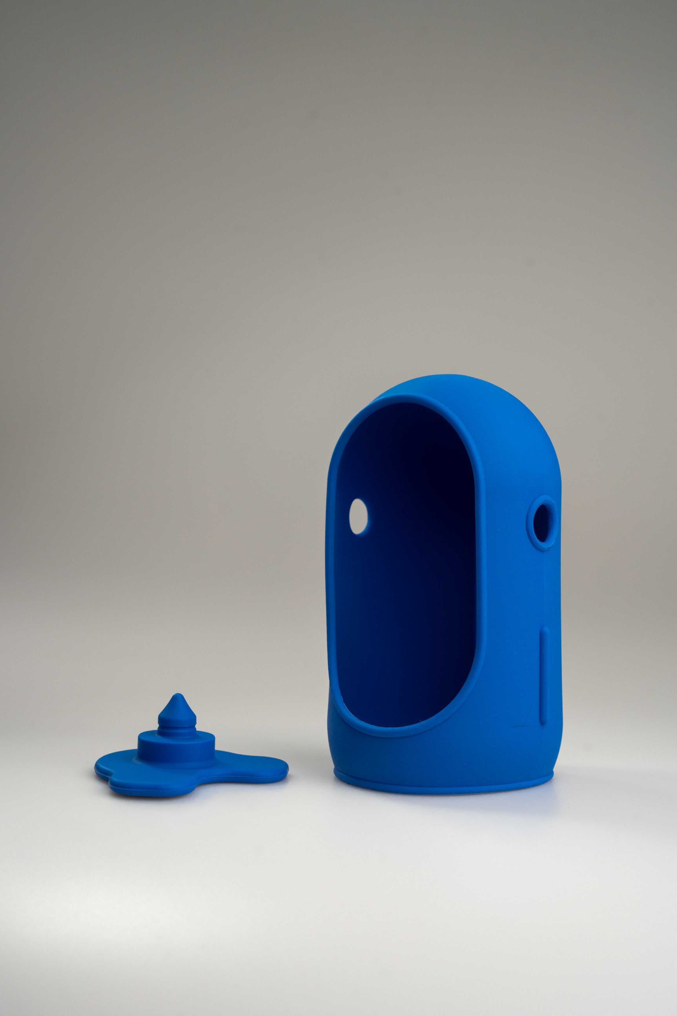 Blue silicone outfit for Jules with its matching base