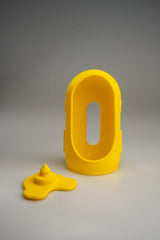 Yellow silicone outfit for Jules with its matching base