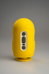 Back of Jules in the yellow outfit, showing the control buttons and USB-C port